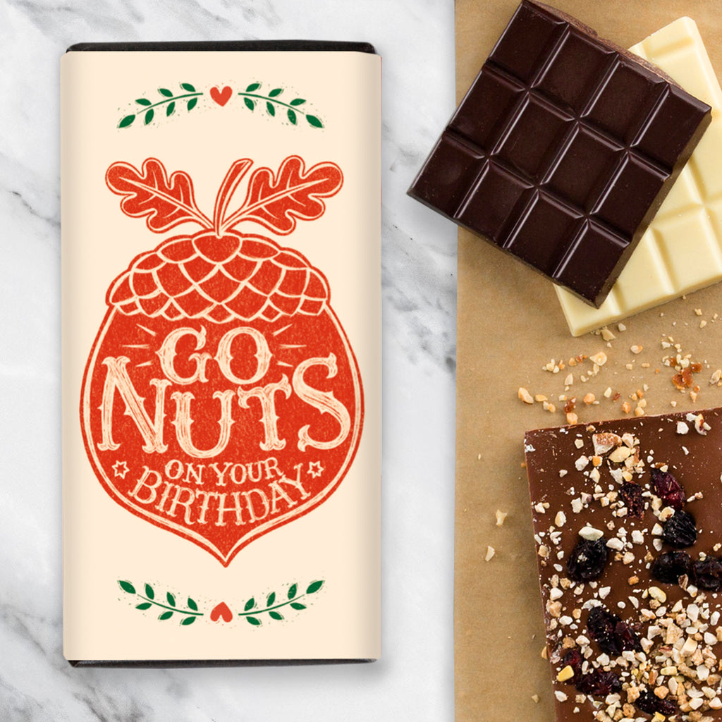 Chocolate Bar with Go Nuts on Your Birthday wording and an illustration of a big orange nut